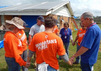 Mississippi tornado response Samaritan's Purse prayer circle