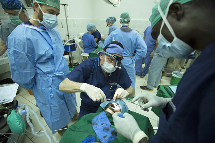 Dr. Thomas Boeve completes a surgical suture on his patient. Depending on the severity of the cleft lip, an operation could be completed in just one hour. This allowed our doctors time to complete up to 15 surgeries per day.