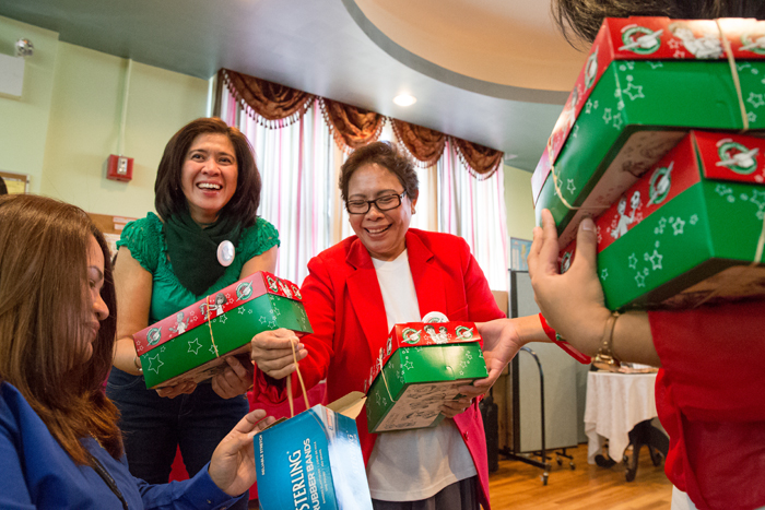 Members of Queens Bible Church are praying the shoebox gifts ease the pain of suffering children in the Philippines.