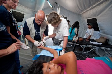 Storm survivors receive compassionate care from medical professionals serving with our disaster response team.