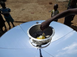 An egg prepared in the solar cooker is almost ready.