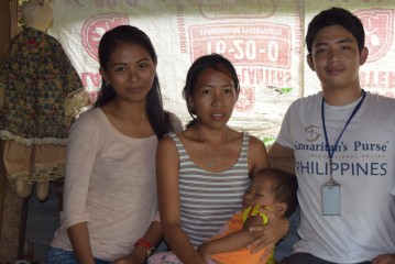 Samaritan's Purse staff Gen (left) and Kim (right) went to visit Marilyn and two-year-old Joshua.