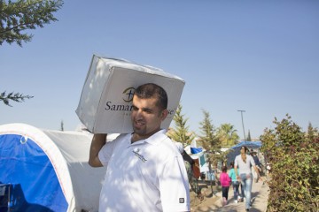 As they deliver supplies, Samaritan's Purse staff members and ministry partners have opportunities to talk about Christ.