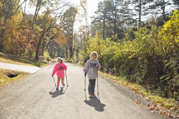 Faith not only learned to walk, but now she and Griffin train for athletic events.