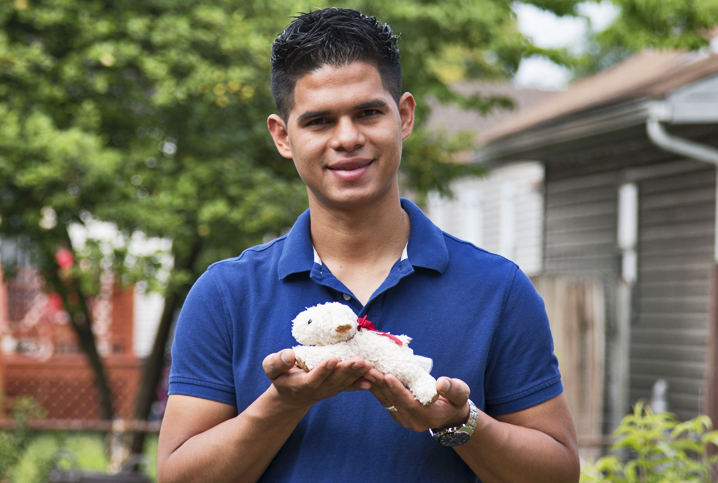 Luis with his toy lamb