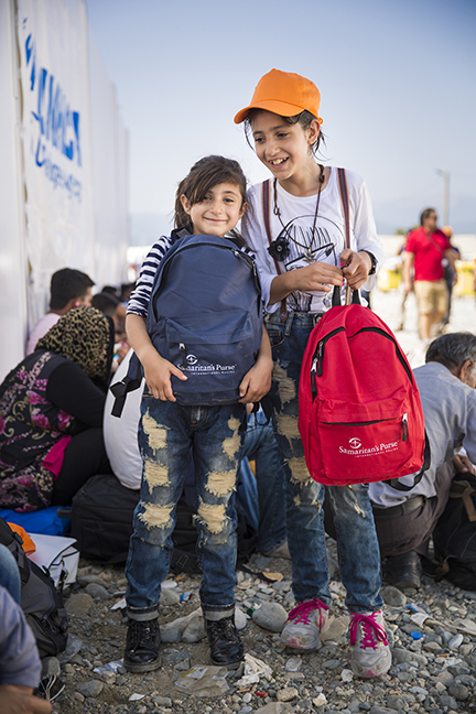 Tala, 11, and Tima, 9, from Syria received backpacks from Samaritan's Purse on September 17.