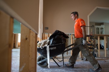 Samaritan's Purse Volunteer Steven Bruno removes sheet rock and insulation from a home in Monroe, Louisiana. 