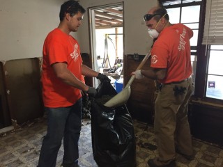 Samaritan's Purse volunteers at the Behan home in Texas. Flooding, Orange County, Texas