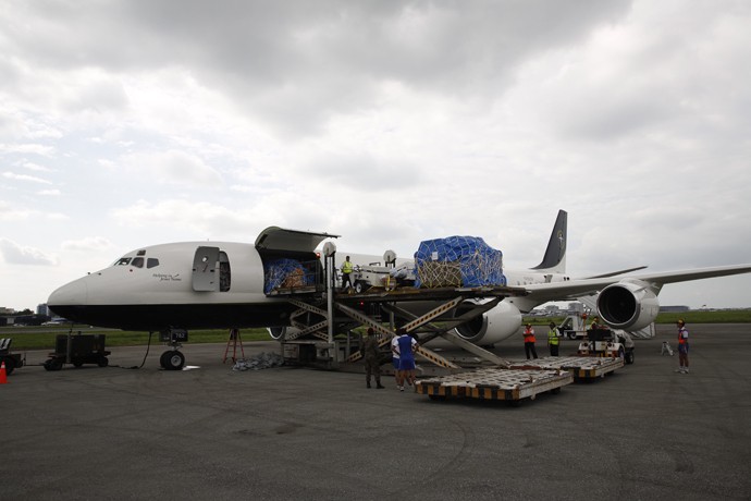 Samaritan's Purse, Ecuador earthquake, relief, medical. Our DC-8 has already arrived safely in Ecuador (April 20). Equipment is being unloaded for the emergency field hospital. 