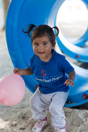 1yo Alazne Ursula Veiva Mamani with mother Vicenta; CHP Bolivia kids with host family Bentley and Maureen Robinson in Grand Cayman