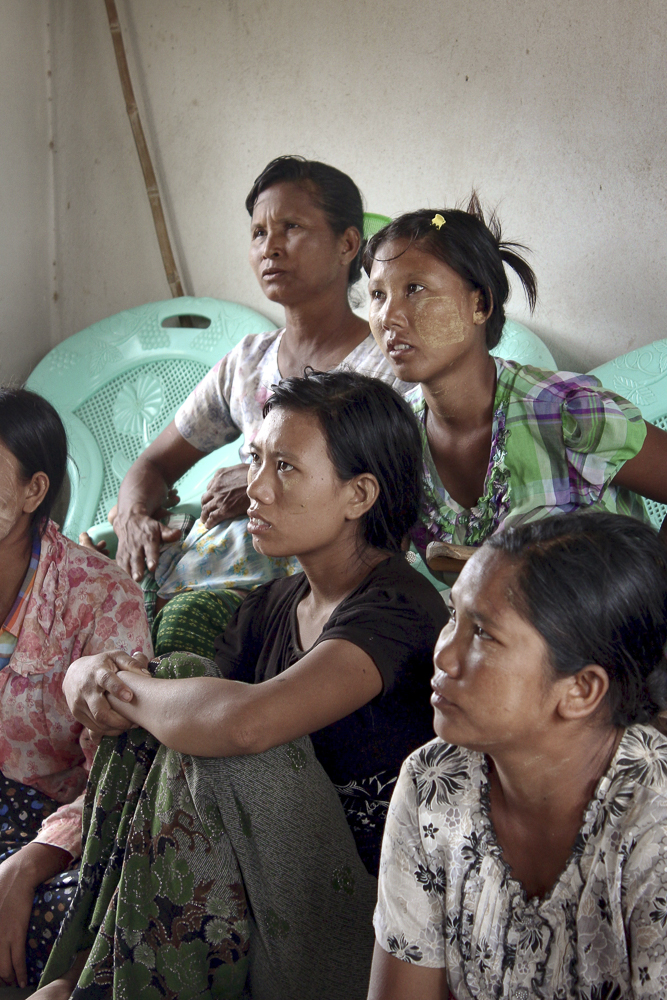 Women listening to training about menstrual health