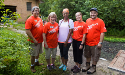 Homeowner Denise Mack is flanked, from left, by Bob and Ruthie Cooper and Kerryn and Ryan Reilly.
