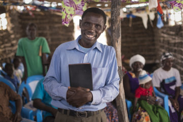 Pastor William Kenga stands inside Biyubu Soul Harvest Church that Samaritan’s Purse helped construct. 