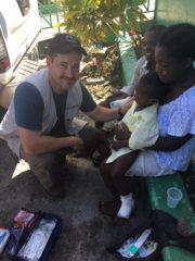Dr. Lance Plyler treating a patient in southern Haiti after Hurricane Matthew.