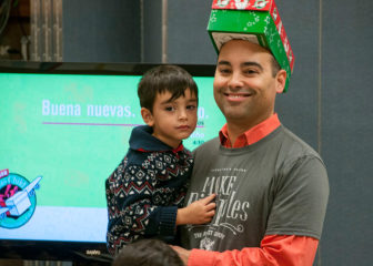 Project leader Eric Huertas says he has the privilege of planning the best party of the year—shoebox packing parties. His children, including 3-year-old Seth, help him promote the events by coloring posters.