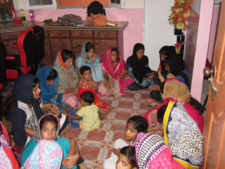 Women from the center gather for prayer and fellowship. 