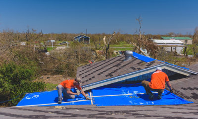 Samaritan's Purse volunteers tarp roofs of damaged homes in coastal Texas.