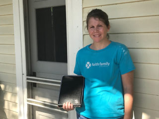 Mandy Robinson with the Billy Graham Study Bible given to her by Samaritan's Purse volunteers. 