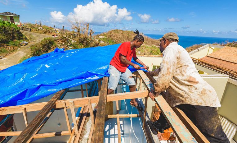 Our teams have distributed heavy-duty shelter plastic to nearly 4,500 households along the west coast of Dominica. In the wake of Hurricane Maria we're also providing safe drinking water and medical care.