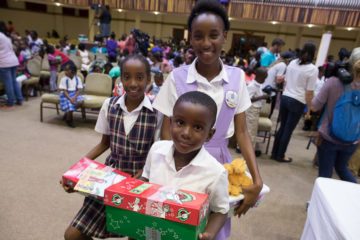 Alisha, 9; Kwasi, 5; and Aleyah received shoebox gifts in Barbuda.