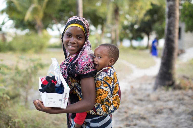 Shoebox gifts can bless a child and her young mother with essential items, fun items, and the Gospel of Jesus Christ.