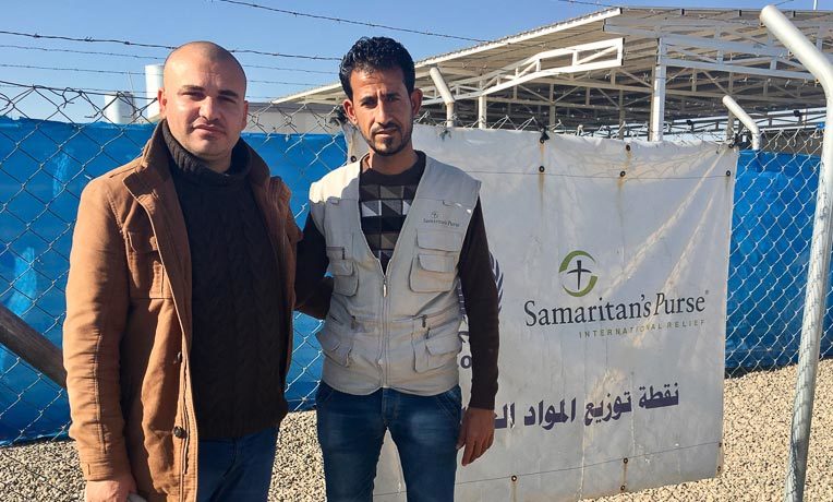Salim (right), who works as a guard for Samaritan’s Purse in Iraq, has learned to forgive ISIS through our Healing Wounds of Trauma parenting classes.