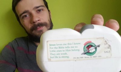 Temo shows where he first saw the Operation Christmas Child logo and the lyrics of “Jesus Loves Me.”