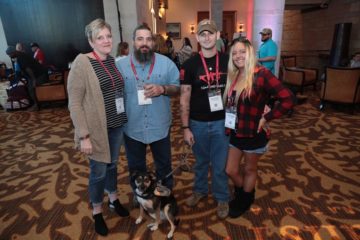 Marine Master Sergeant Gregg Bellucci and his wife Corie (at left) meet with Marine Corporal Scottie Williams and wife Savanna at the 2018 Operation Heal Our Patriots Reunion in Fort Worth.