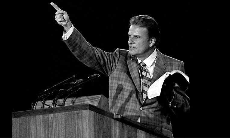 Billy Graham preaches (historical image)--"Billy Graham: An Extraordinary Journey"