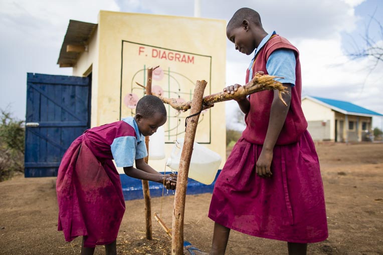 Students wash their hands at the school, an important aspect of our hygiene training.