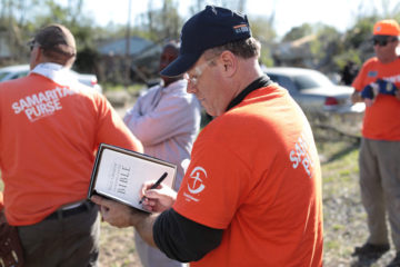 Every homeowner we help receives a Bible signed by the volunteers who worked on their home.