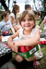 Myroslava, 5, is excited to receive her shoebox gift!