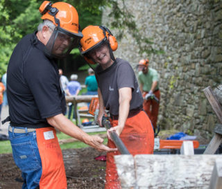 The North American Ministries volunteer conference featured workshops such as chainsaw safety and technique. Volunteers were able to practice and hone their skills.