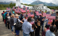 Military couples are greeted by an enthusiastic crowd at Samaritan Lodge Alaska.