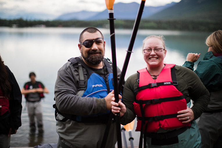 Tasha and Brandon Hecke enjoy their time by the lake after their kayaking tour.