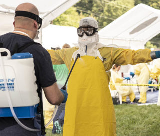 Samaritan's Purse staff members practice donning and doffing personal protective equipment at a recent Ebola preparedness training in Wilkesboro, North Carolina.
