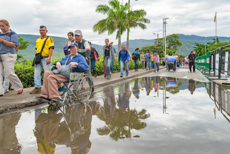 Every day tens of thousands of migrants travel from Venezuela to Colombia where they hope to help meet their families' basic needs.