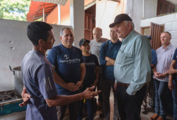 Franklin Graham meets with Jose Luis Ochoa. He was brought to Christ at the shelter and was baptized in the nearby river. 