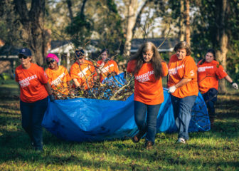 Volunteers serving in Albany, Georgia, are clearing piles of debris and trees from yards. Photo courtesy of Sherwood Baptist Church