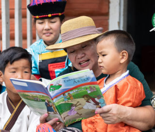 Tuya shares the Gospel with children of the unreached Buryat people group using The Greatest Journey workbook.