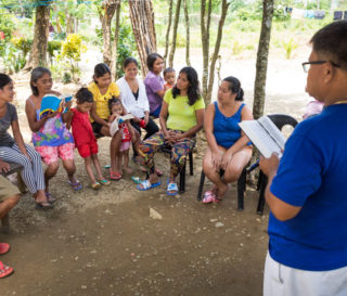 Members of a village in the Philippines gather for Bible study led by Marcelino Yongson. Marcelino and his wife Tess learned how to disciple believers and how to start small groups through a Samaritan's Purse training.