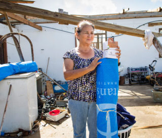 Bernadita and her family hid in a closet to escape the storm's powerful wind. She is one of hundreds of people who have received a tarp and other relief supplies from Samaritan's Purse.