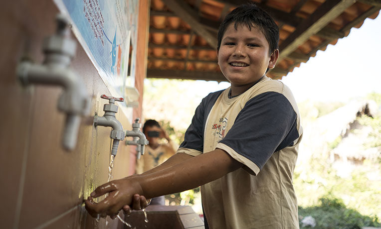 Our water, sanitation, and hygiene projects in Bolivia include hand washing stations, clean water access, and restroom facilities.