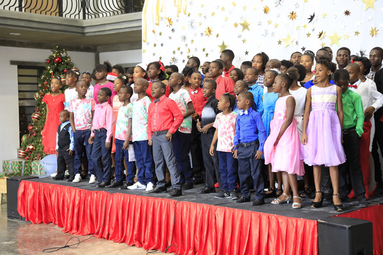 The Christmas celebration at the Greta Home includes a special musical performance by students.