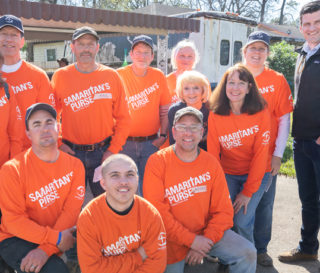 Edward Graham joins volunteers at a rebuild site in southeast Texas.