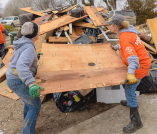 Volunteers clean up after Nebraska floods.