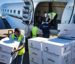 Our DC-3 landed with emergency supplies in Beira, Mozambique, where we are beginning distributions.