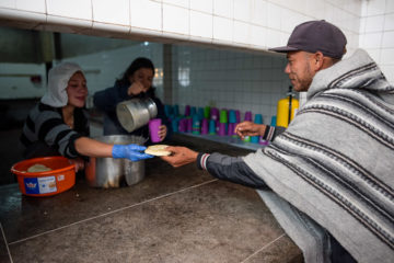 Alcides received breakfast after spending the night at our shelter in Berlin.