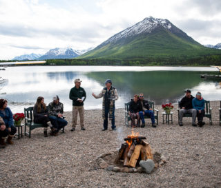 Five military couples gathered on the shore of Lake Clark to rededicate their marriages to Jesus Christ together with Chaplains Emory Lussi (center, left) and Jim Fisher.