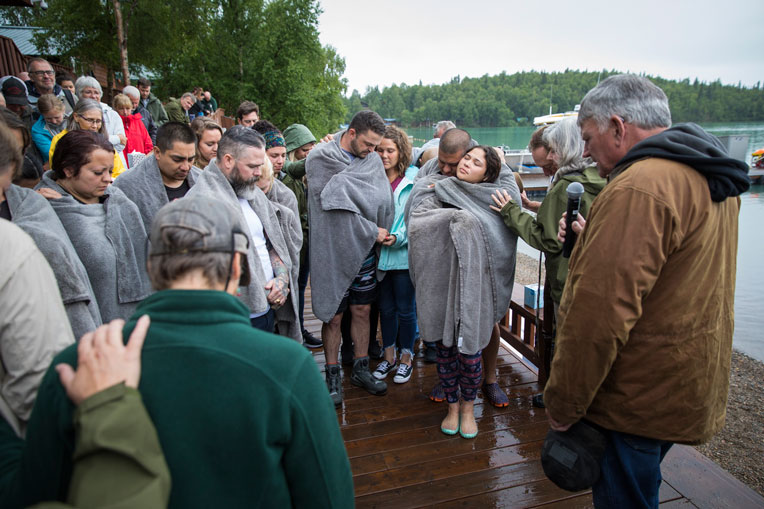 Joe and Brittany joined other couples as Franklin Graham prayed with participants who were baptized.